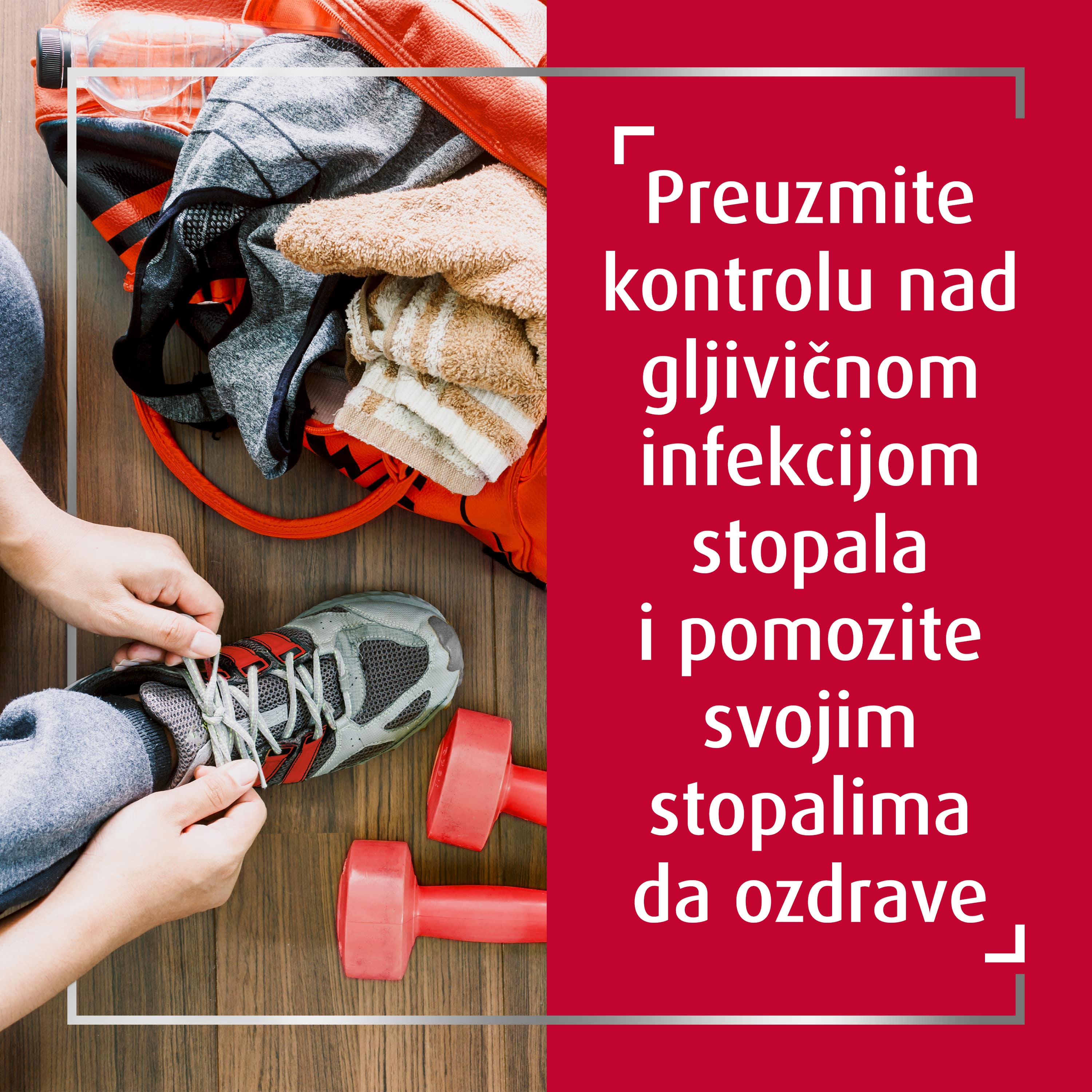Aktivna osoba veže sivu tenisicu pored utega u teretani